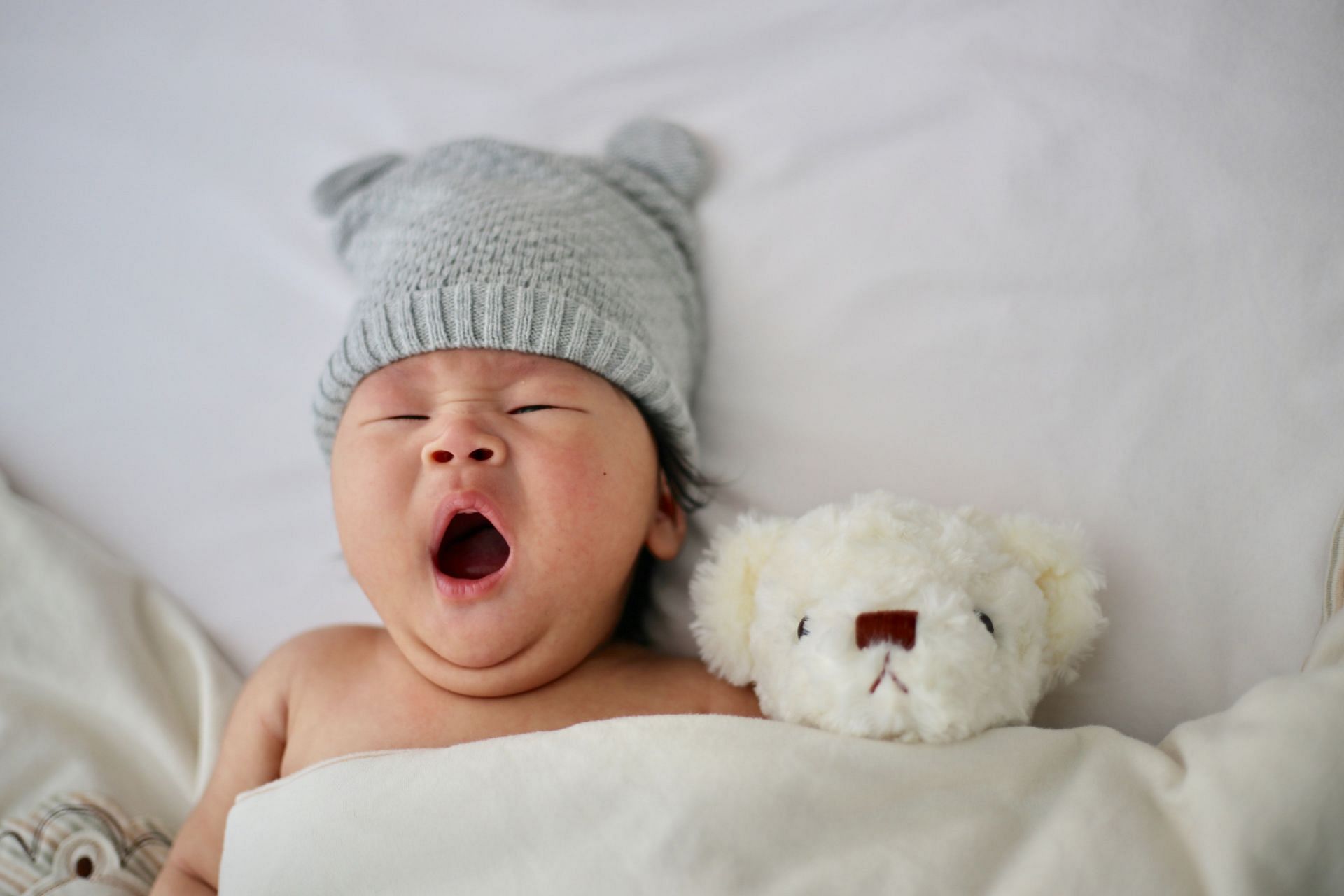 These conditions are often developed in easly stages, most likely when baby is in womb. (Image via Unsplash/Minnie Zhou)